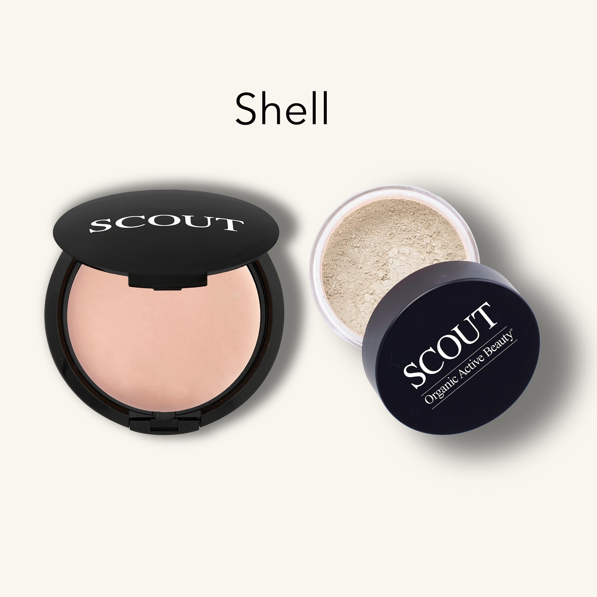 SCOUT powder compact with open lid showing beige powder on a white background