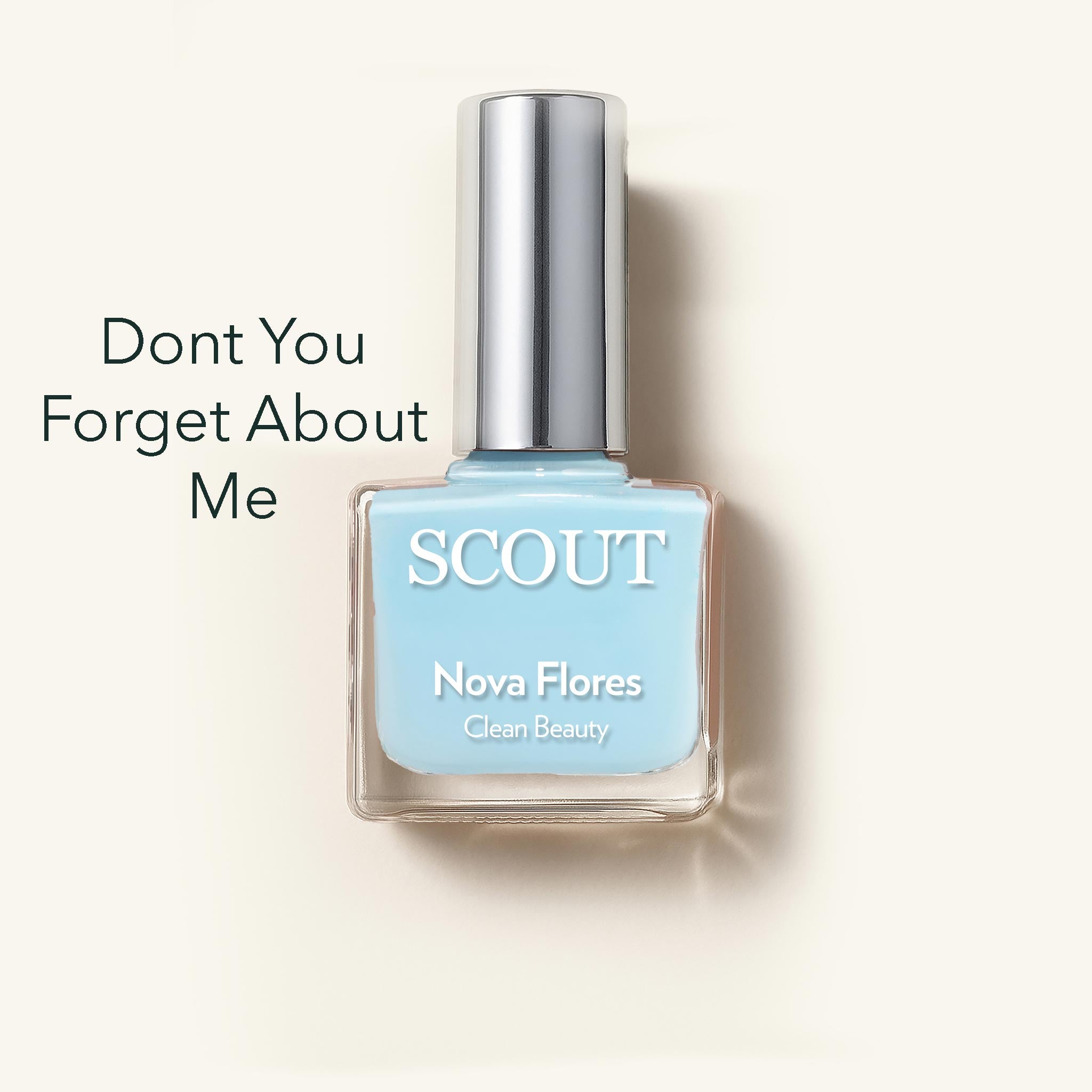 Blue nail polish bottle with 'SCOUT' branding on a light beige background