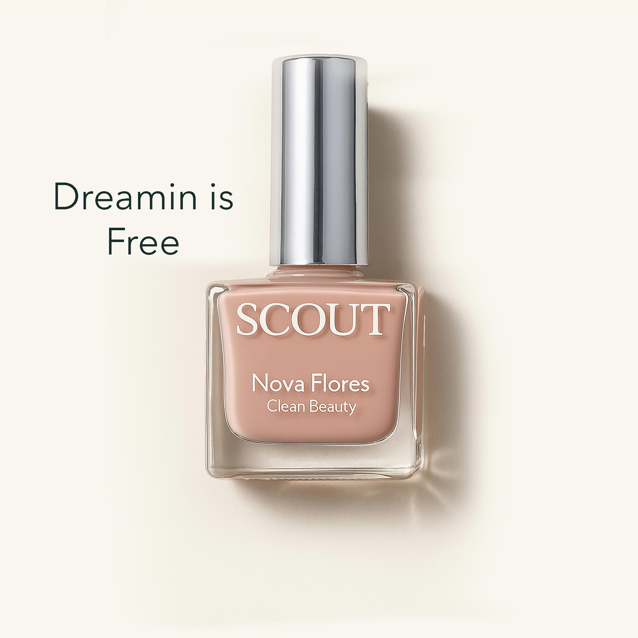 SCOUT nail polish bottle with 'Dreamin is Free' text on a light background