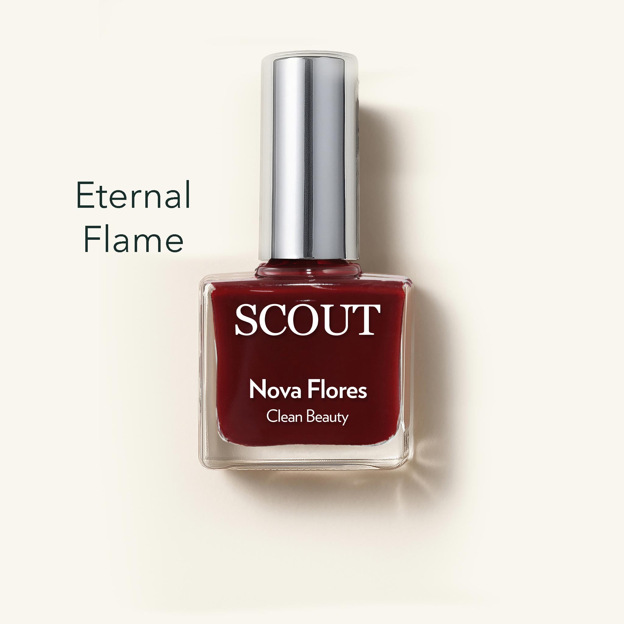 SCOUT nail polish bottle with 'Eternal Flame' color on a beige background