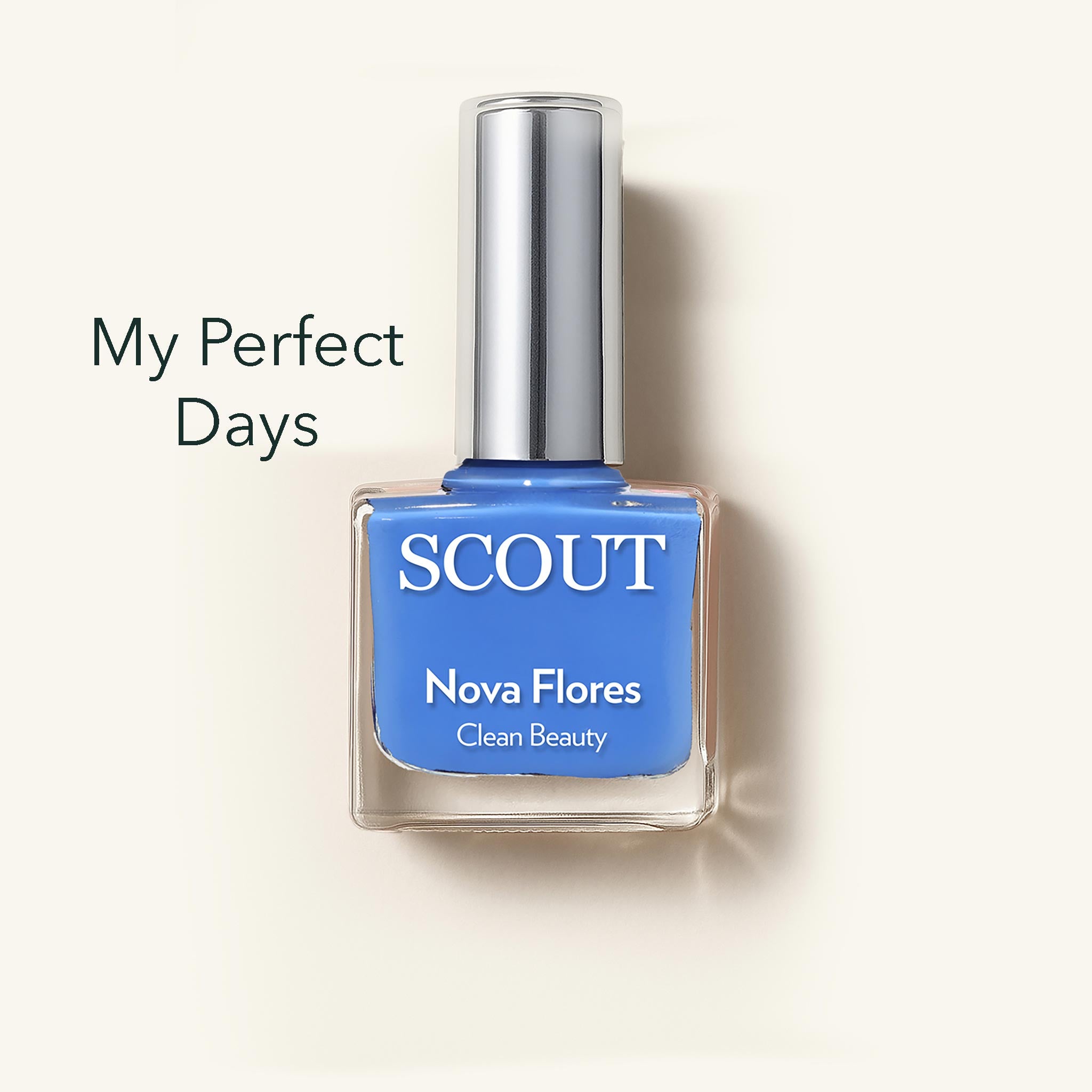 Blue nail polish bottle with 'SCOUT' branding on a light background