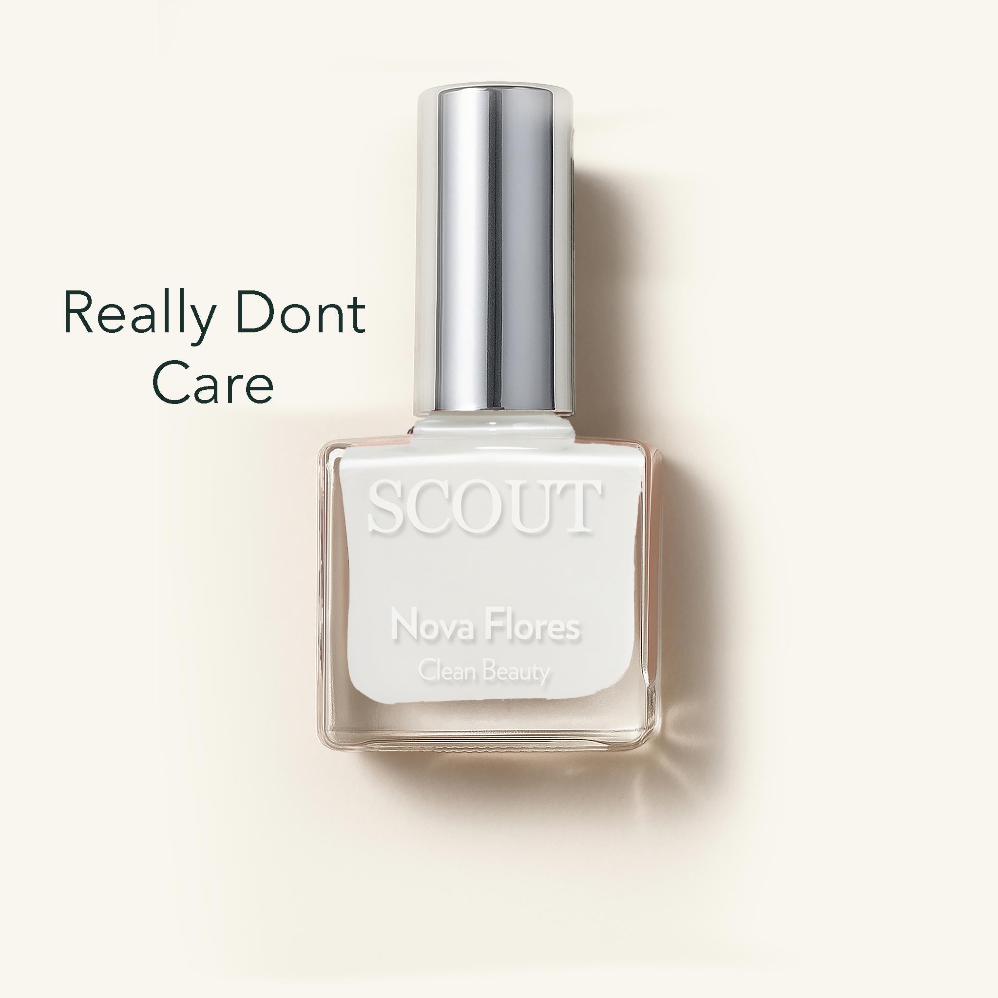 SCOUT nail polish bottle with 'Really Dont Care' text on a beige background