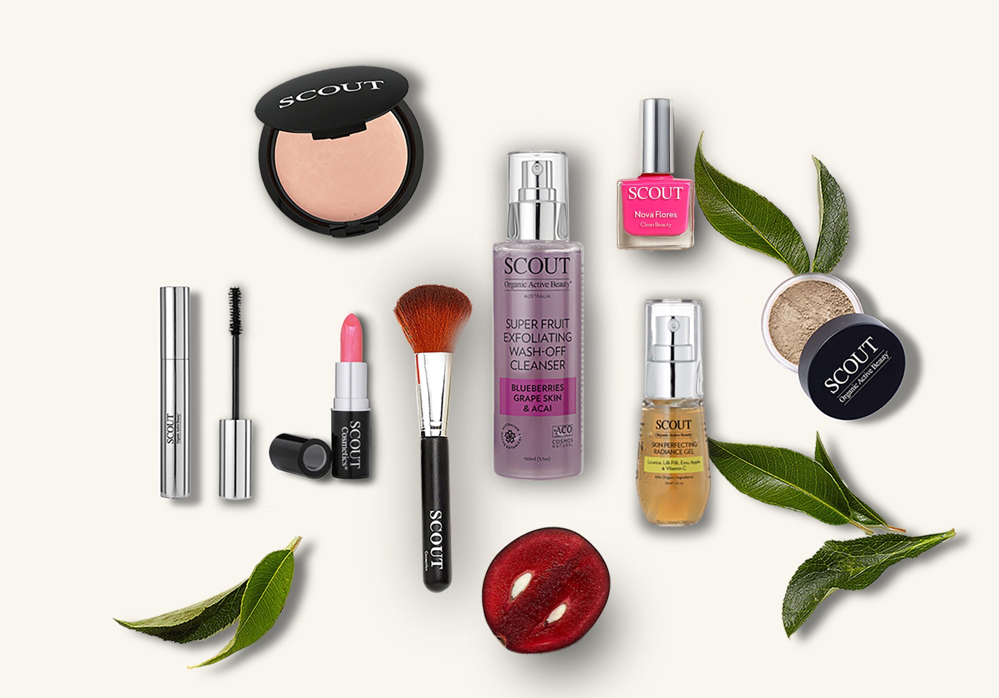 Collection of Scout skincare and makeup products on a white background with green leaves.