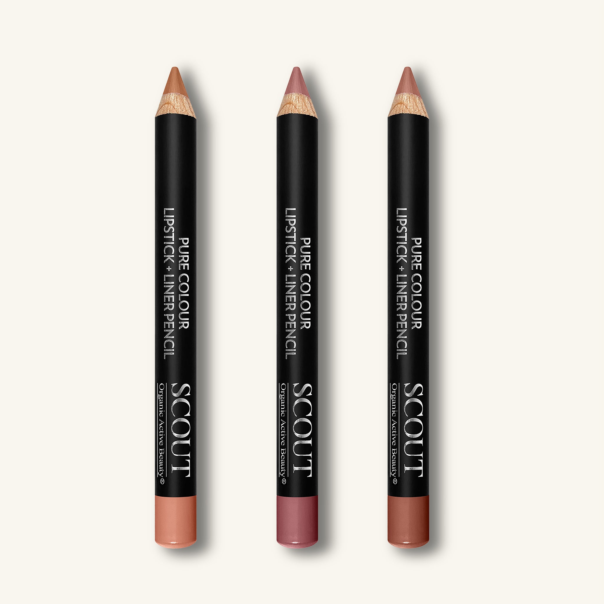 Three lip pencil crayons from the brand 'Scout' on a white background