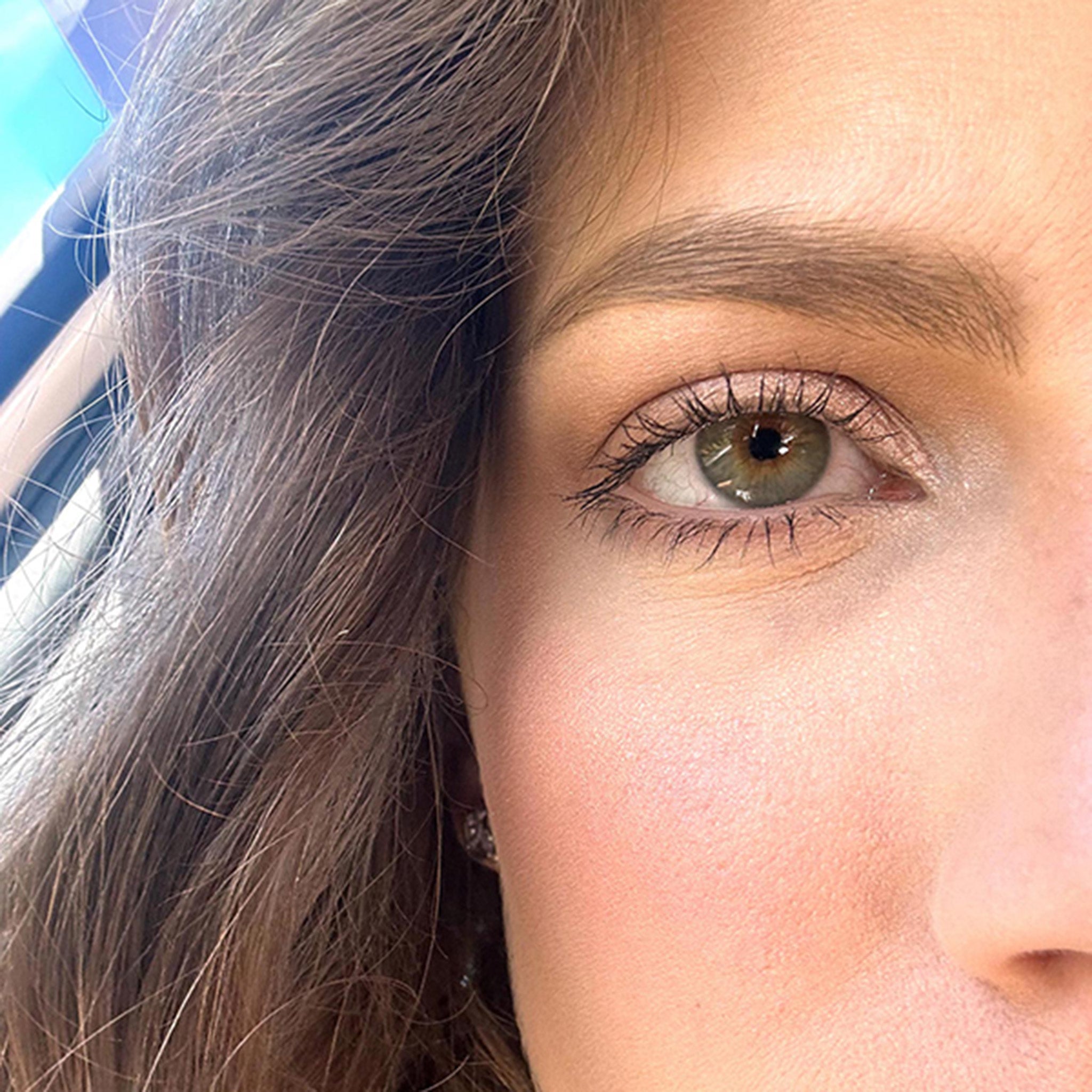 Model wearing SCOUT Mascara Long Length + Big Lash