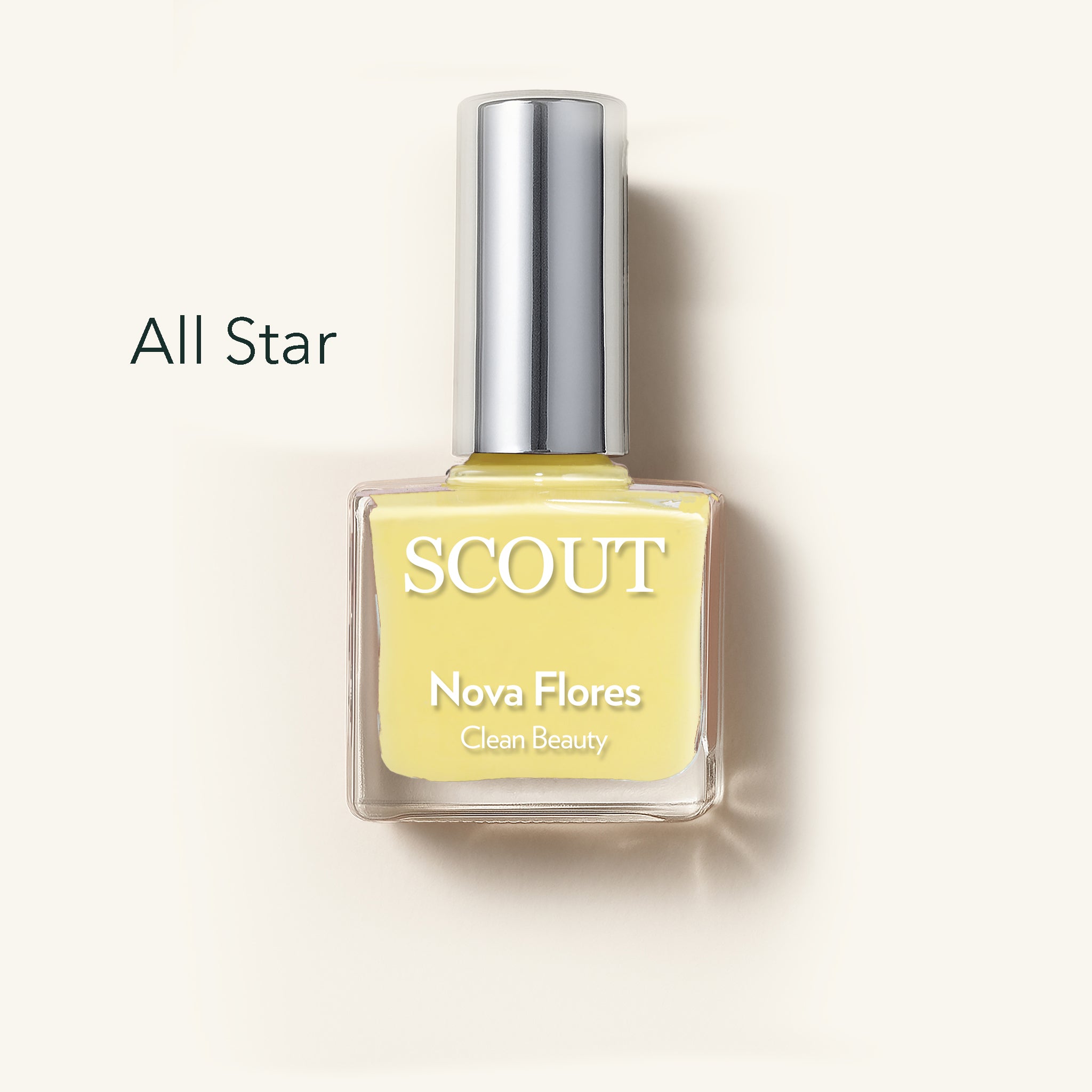 Yellow nail polish bottle with silver cap labeled 'SCOUT' on a beige background. Made in Australia, Superfood Ingredients. Toxic Free, Highly-Effective, Vegan. Protect nail health.