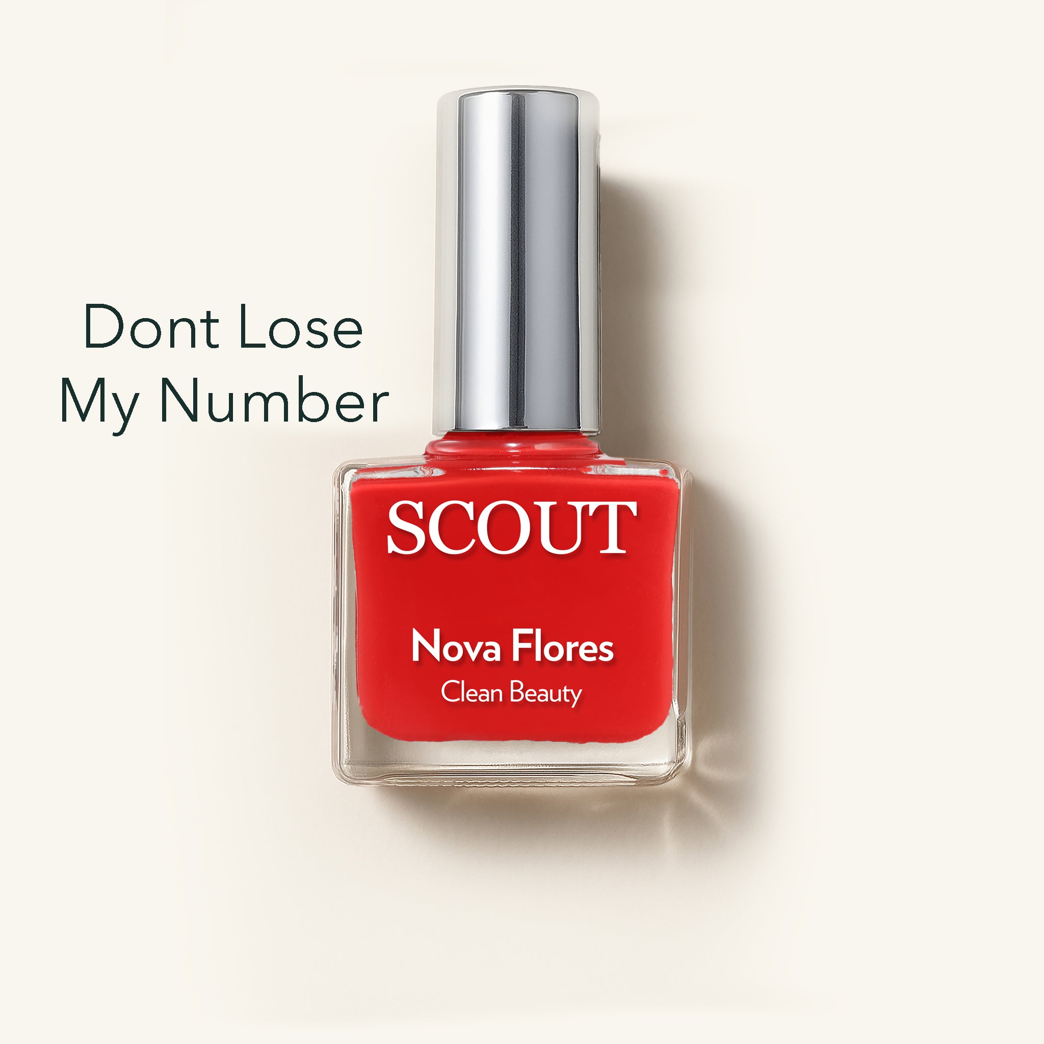 Red nail polish bottle with silver cap on a white background, featuring the brand 'SCOUT'. Made in Australia, Superfood Ingredients. Toxic Free, Highly-Effective, Vegan. Protect nail health.