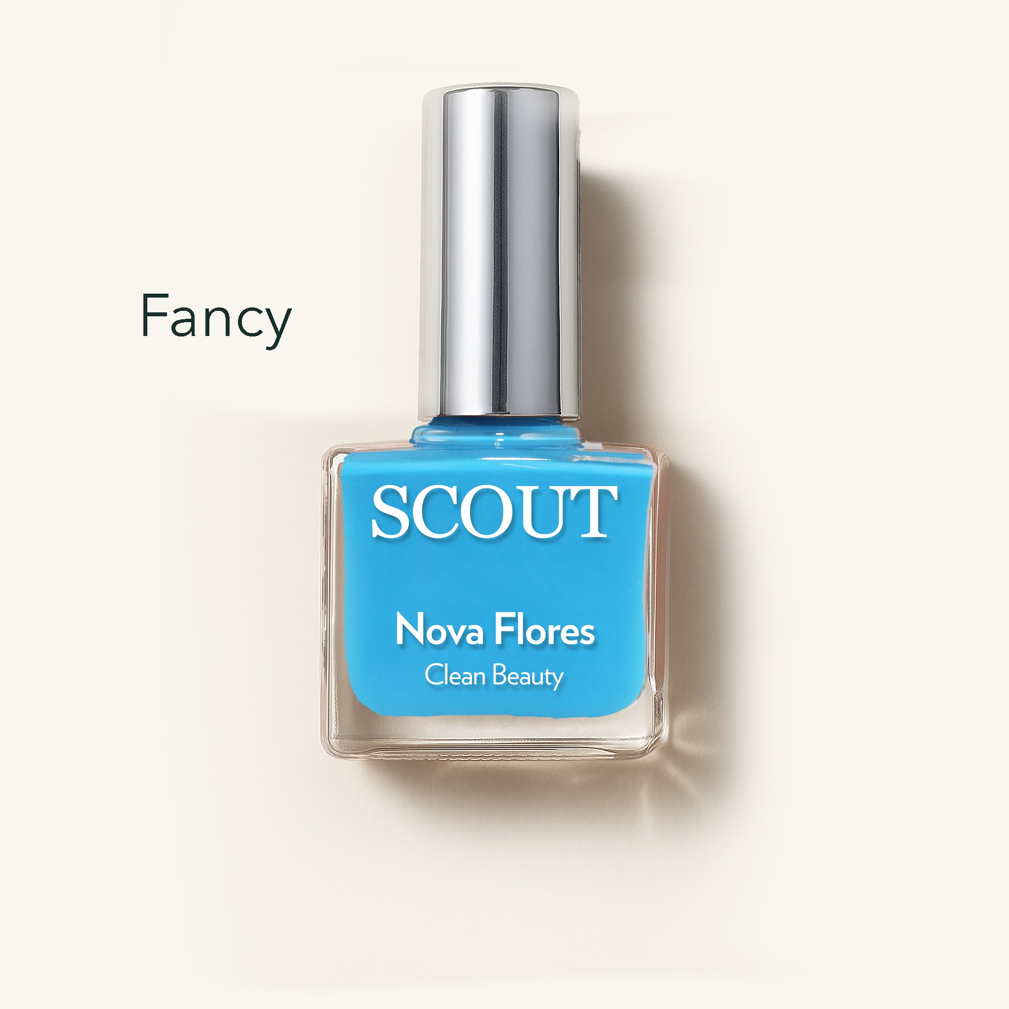 Blue nail polish bottle with 'SCOUT' branding on a light background. Made in Australia, Superfood Ingredients. Toxic Free, Highly-Effective, Vegan. Protect nail health.