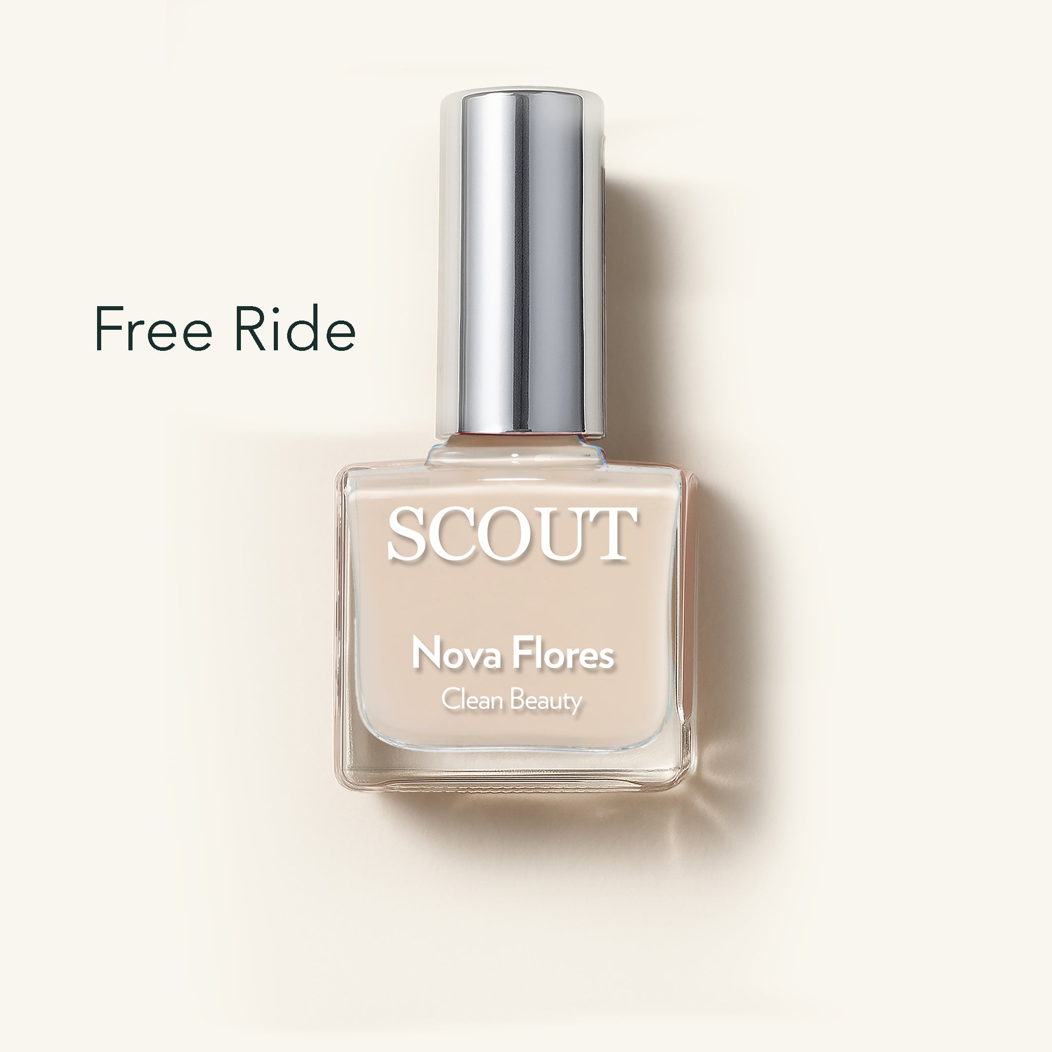 SCOUT nail polish bottle labeled 'Free Ride' on a beige background. Made in Australia, Superfood Ingredients. Toxic Free, Highly-Effective, Vegan. Protect nail health.