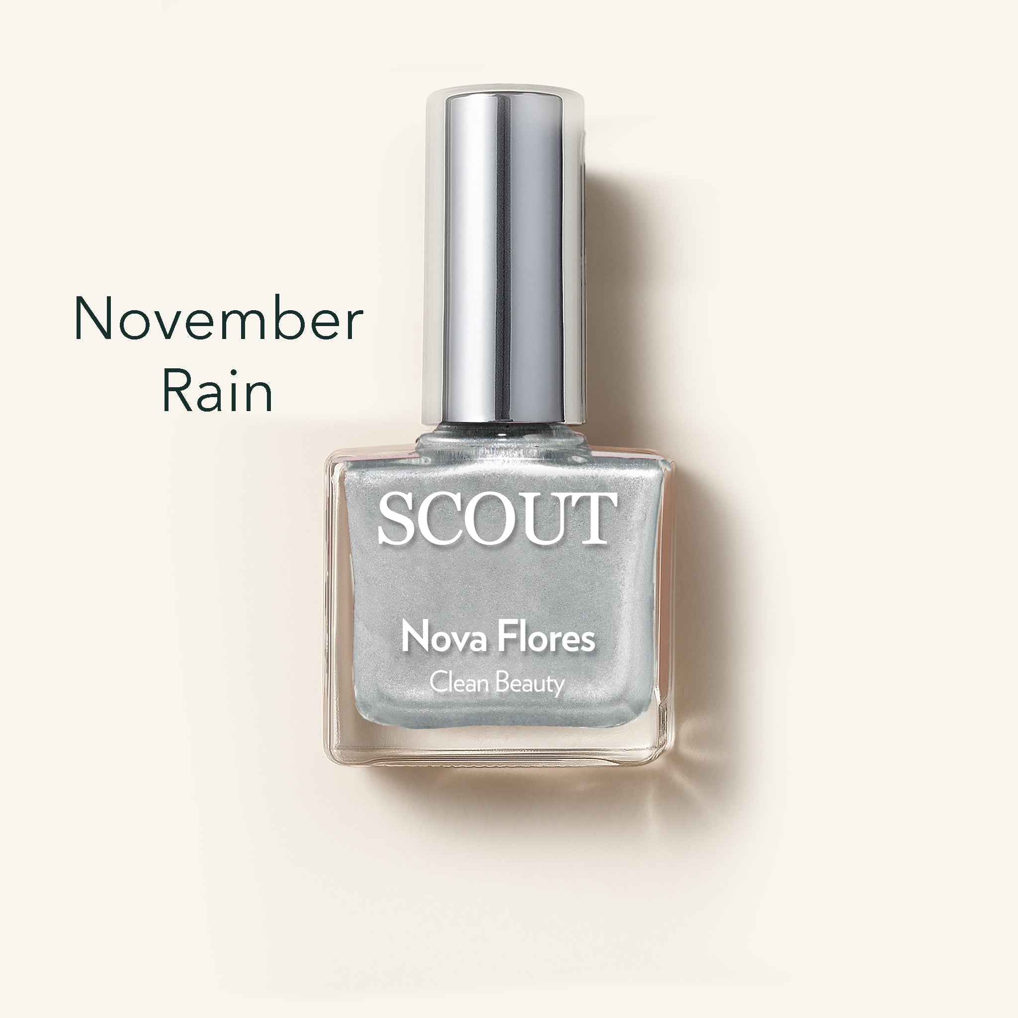 SCOUT nail polish bottle labeled 'November Rain' on a light background. Made in Australia, Superfood Ingredients. Toxic Free, Highly-Effective, Vegan. Protect nail health.