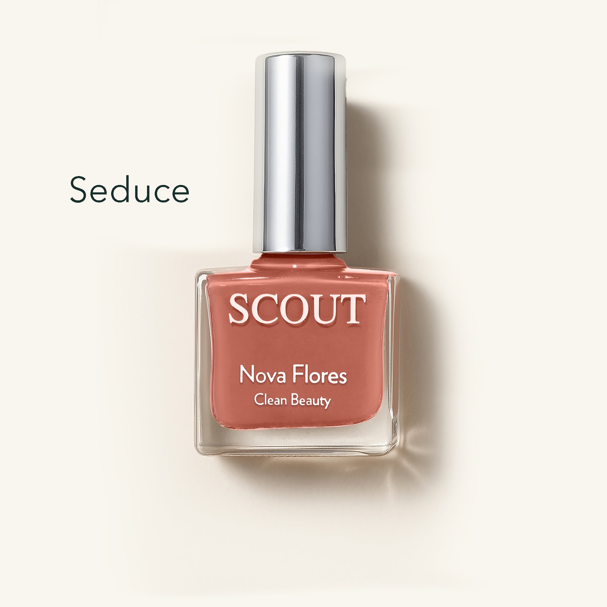 SCOUT nail polish bottle labeled 'Seduce' on a light background. Made in Australia, Superfood Ingredients. Toxic Free, Highly-Effective, Vegan. Protect nail health.
