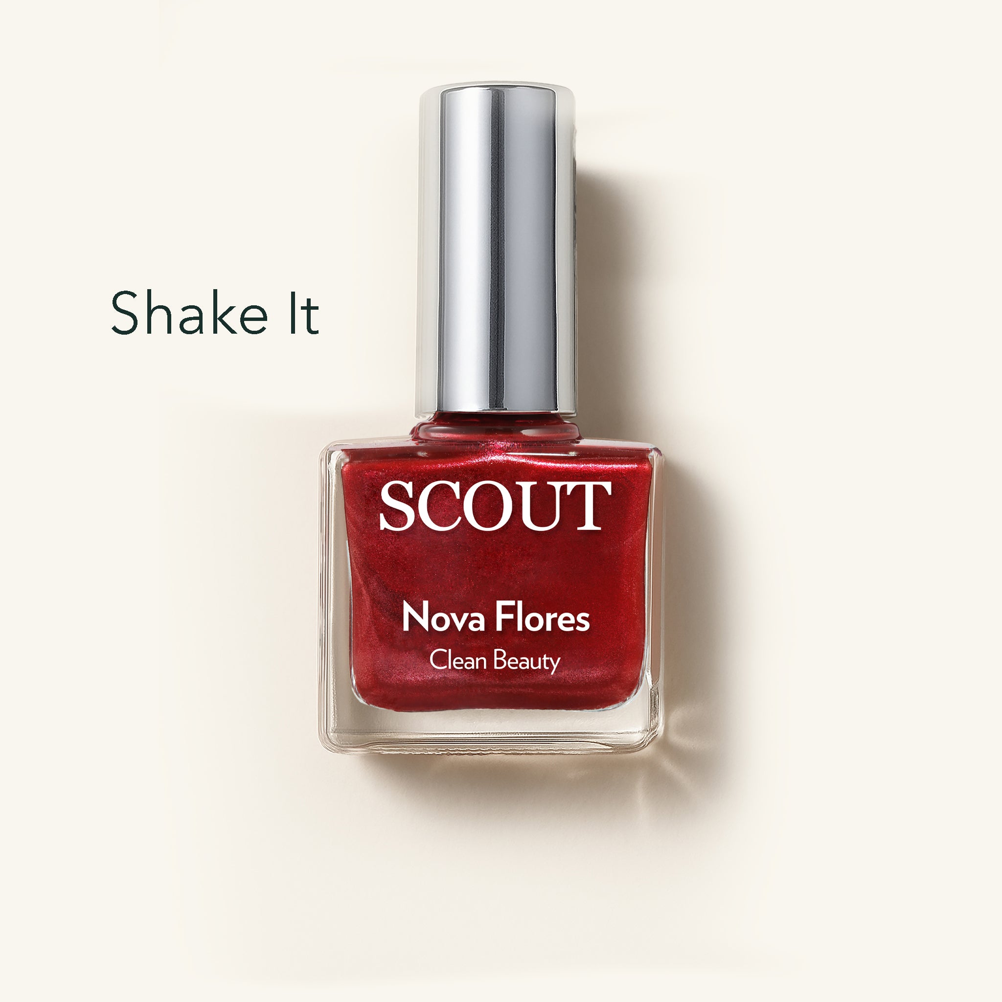 Red nail polish bottle with silver cap labeled 'SCOUT Nova Flores' on a light beige background. Made in Australia, Superfood Ingredients. Toxic Free, Highly-Effective, Vegan. Protect nail health.