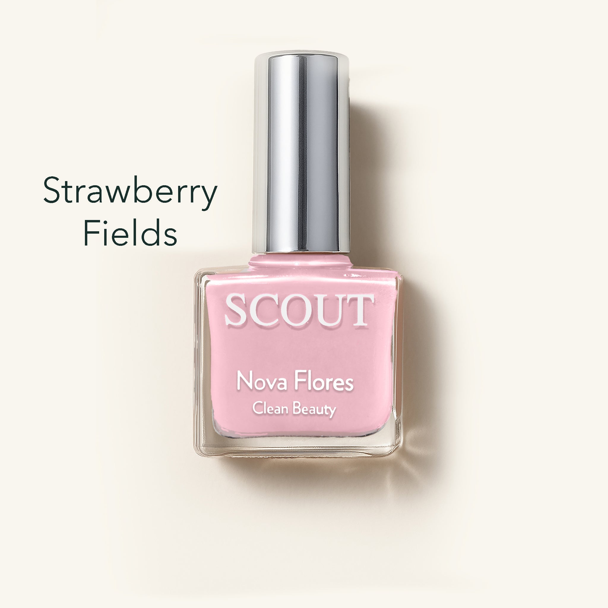 Pink nail polish bottle labeled 'Strawberry Fields' by Scout on a beige background. Made in Australia, Superfood Ingredients. Toxic Free, Highly-Effective, Vegan. Protect nail health.