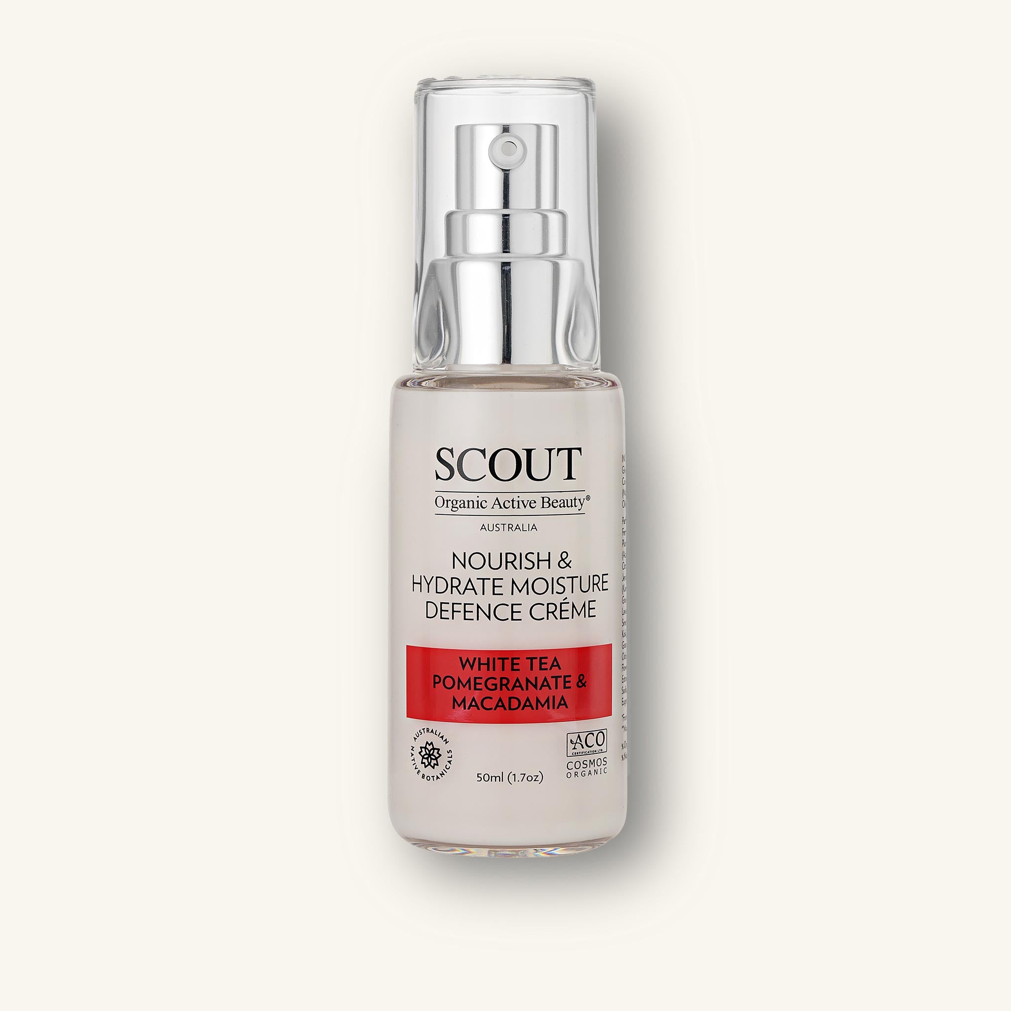 A bottle of SCOUT Nourish & Hydrate Moisture Defence Crème with White Tea, Pomegranate and Macadamia, with a clear pump dispenser, labeled for skincare.