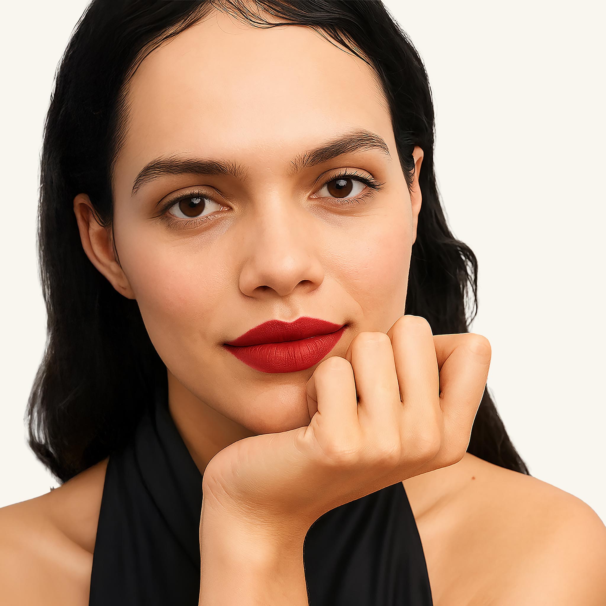 Close-up portrait of a woman wearing SCOUT Lipstick in Destiny, a classic Parisian red, showing a soft-matte finish and natural skin texture; clean Australian beauty brand product image on a light background.