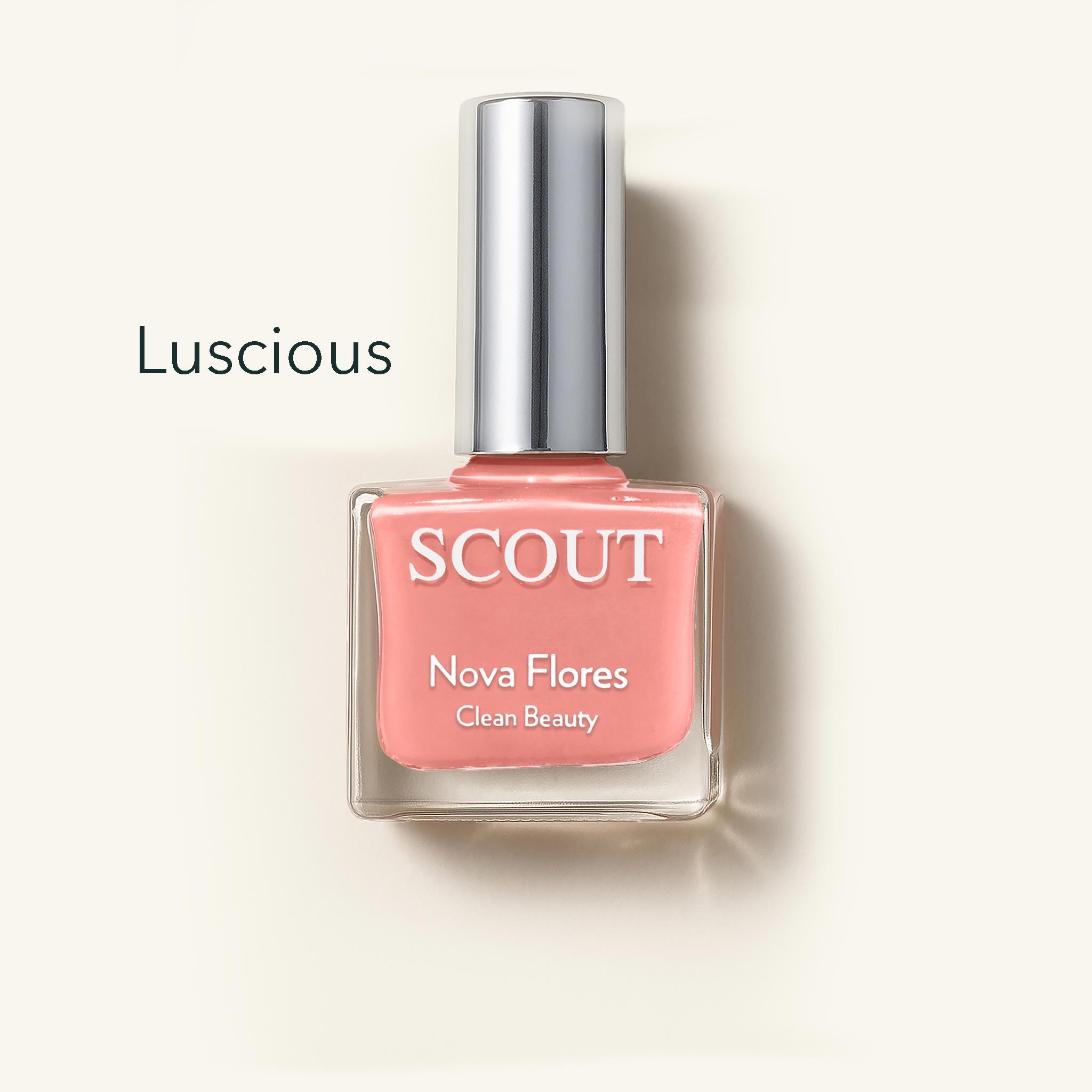SCOUT nail polish bottle labeled 'Luscious' on a beige background
