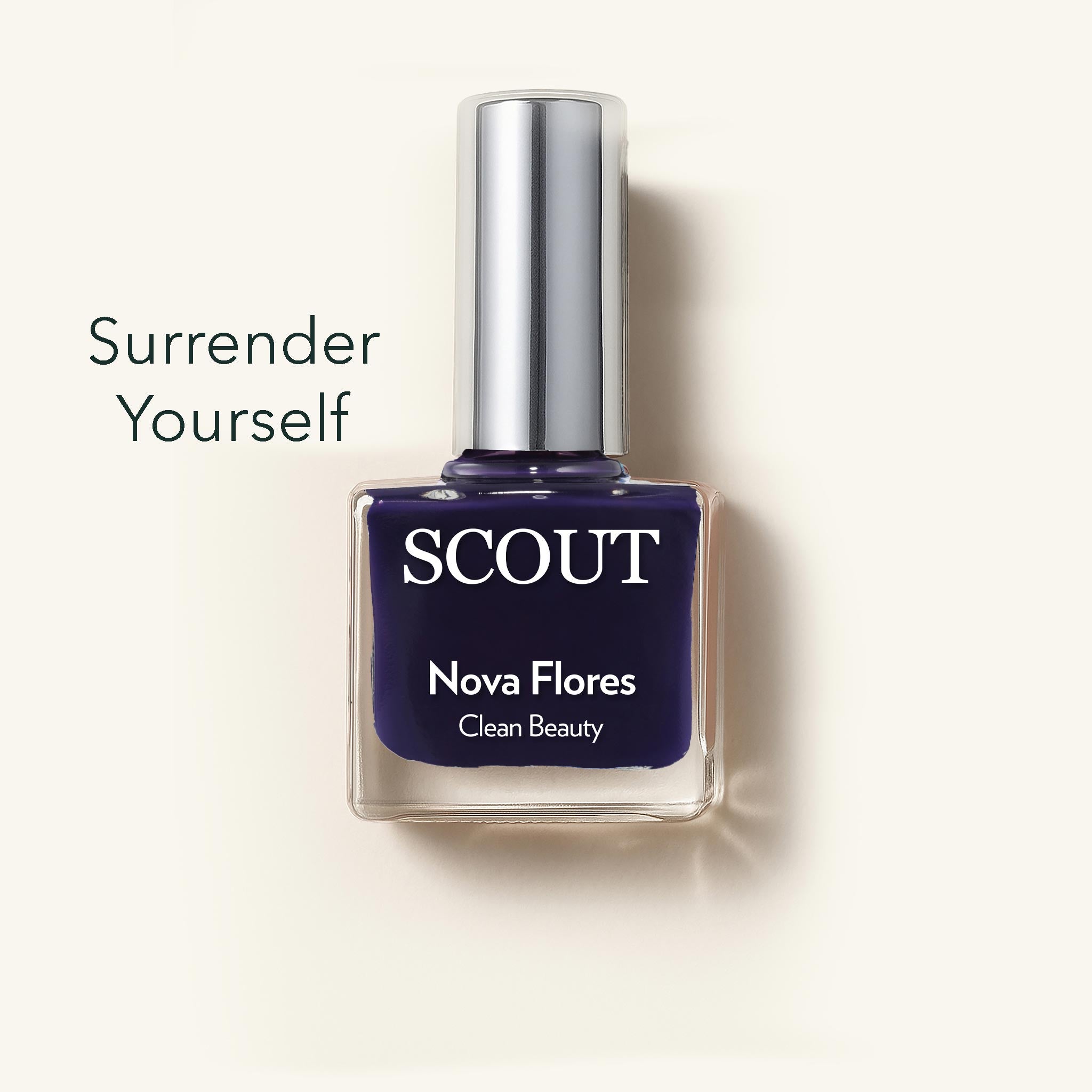 Navy nail polish bottle with 'SCOUT' branding on a light beige background
